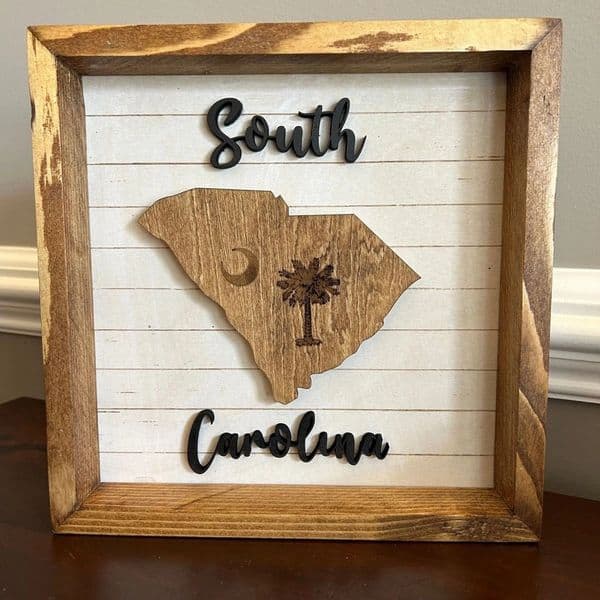 South Carolina wooden map with "South Carolina" text, moon, and palm tree, rustic shadow box wall decor.